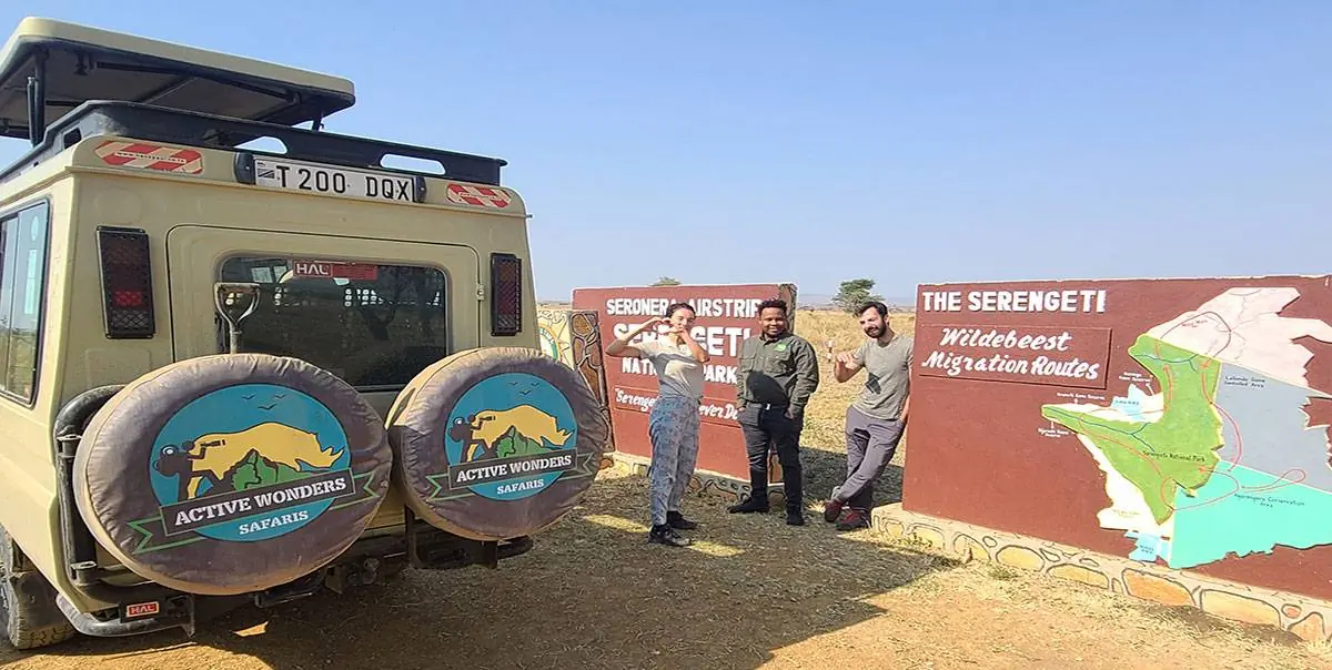 Active Wonders Safaris vehicle and team at the Serengeti gate