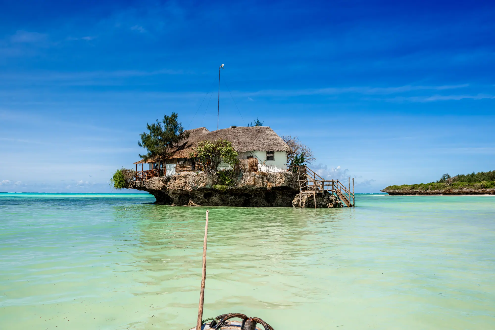 The rock restaurant surrounded by turquoise
